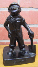 Load image into Gallery viewer, Old Cast Iron FOUNDRY WORKER COAL MINER Figural Doorstop Hat Goggles Shovel
