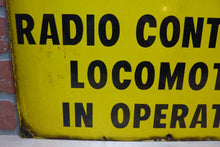 Load image into Gallery viewer, CAUTION RADIO CONTROLLED LOCOMOTIVE IN OPERATION Old Porcelain Sign RR Train
