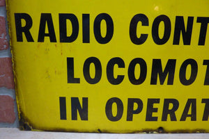 CAUTION RADIO CONTROLLED LOCOMOTIVE IN OPERATION Old Porcelain Sign RR Train