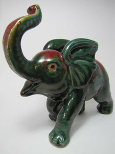 Old Art Pottery Elephant wonderful artwork green dp red glaze trunk up charging