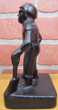 Load image into Gallery viewer, Old Cast Iron FOUNDRY WORKER COAL MINER Figural Doorstop Hat Goggles Shovel

