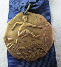 Load image into Gallery viewer, PLAINFIELD YMCA Antique Track Hurdle Sports Award Medallion Ribbon
