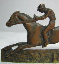 Load image into Gallery viewer, Vintage Jockey riding Horse Bookends brass copper wash ornate detailing rare htf
