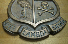 Load image into Gallery viewer, Old PHI LAMBDA SIGMA Brass Medallion Skull Crossbones Embossed Badge Fraternal
