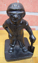 Load image into Gallery viewer, Old Cast Iron FOUNDRY WORKER COAL MINER Figural Doorstop Hat Goggles Shovel
