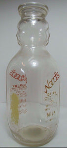 Old Wood's Dairy Milk Bottle Petersburg Hopwell Va glass baby faces figural