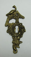 Load image into Gallery viewer, Antique Brass Key Escutcheon Peacock Bird Clamshell Flower Ornate High Relief Raised Detailing
