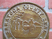 Load image into Gallery viewer, SARATOGA COUNTY SEAL 1866 Old NY Brass Bronze Plaque Marker Sign Advertising New York
