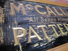 Load image into Gallery viewer, McCALL PATTERNS 10c 15c Antique Reverse on Glass Advertising Sign Wooden Frame early 1900s ROG &#39;All Seams Allowed&#39;
