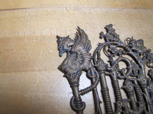 Load image into Gallery viewer, Antique Griffin Winged Monster Beast Torches Flowers Brass Ornamental Decorative Arts Element
