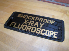 Load image into Gallery viewer, SHOCKPROOF X-RAY FLOUROSCOPE c1930s ROG Reverse On Chip Scallop Edge Glass Sign
