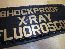 Load image into Gallery viewer, SHOCKPROOF X-RAY FLOUROSCOPE c1930s ROG Reverse On Chip Scallop Edge Glass Sign
