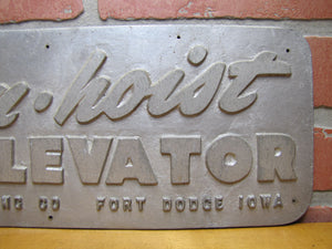 STAN-HOIST ELEVATOR Old Embossed Metal Advertising Sign Plaque STANDARD ENGINEERING Co FORT DODGE IOWA
