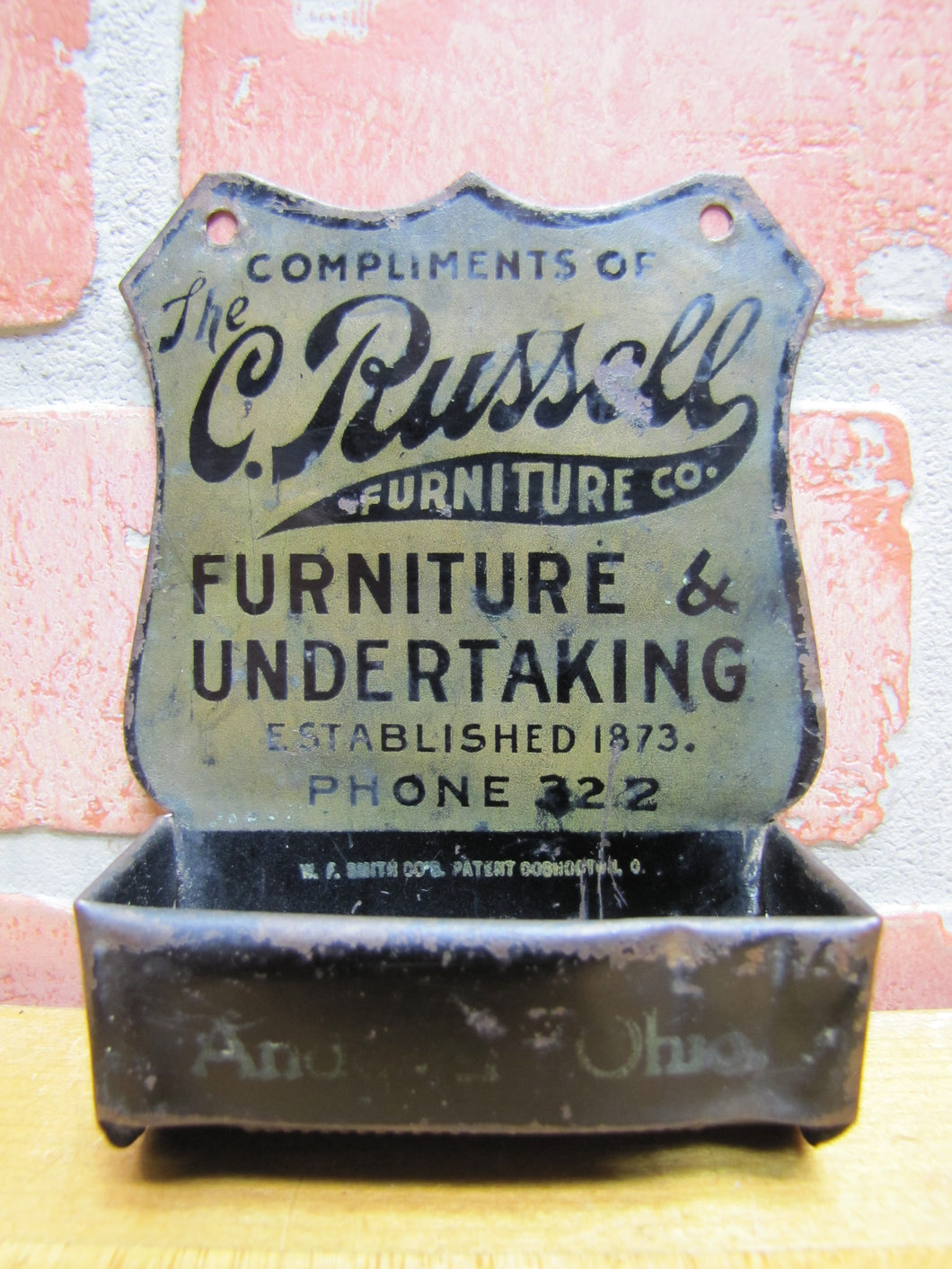 C RUSSELL FURNITURE & UNDERTAKING OHIO Antique Advertising Tin Match Holder W F SMITH CO PATENT COSHOCTON O