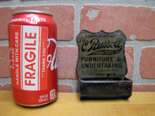 Load image into Gallery viewer, C RUSSELL FURNITURE &amp; UNDERTAKING OHIO Antique Advertising Tin Match Holder W F SMITH CO PATENT COSHOCTON O
