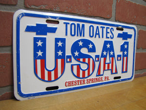 USA 1 TOM OATES CHEVROLET CHESTER SPRINGS PA Vintage Embossed Vanity Plate Signj Ad