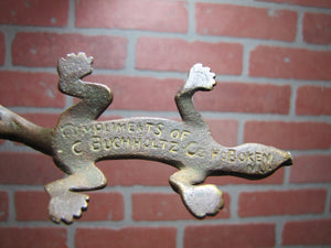 COMPLIMENTS OF C BUCHHOLTZ Co HOBOKEN NJ Antique Advertising Gecko Lizard Brass Bronze Foundry Company Ad