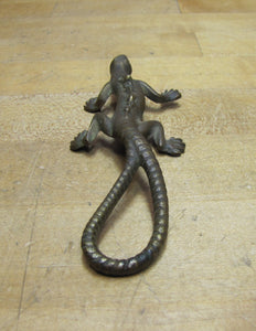 COMPLIMENTS OF C BUCHHOLTZ Co HOBOKEN NJ Antique Advertising Gecko Lizard Brass Bronze Foundry Company Ad
