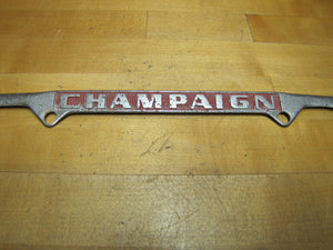 CHAMPAIGN Old Embossed Metal License Plate Frame Auto Truck RV Illinois Sign Ad