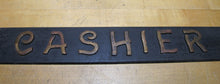 Load image into Gallery viewer, CASHIER Antique Advertising Sign Bronze Embossed Bevel Edge Bank Pawn Shop
