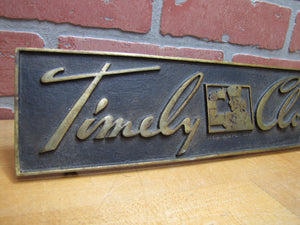 TIMELY CLOTHES Old Store Display Sign BRONZE-CRAFT ADCO NY Counter Register Top