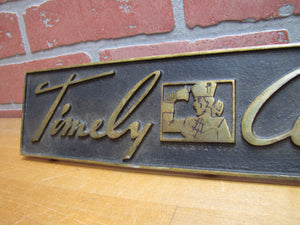 TIMELY CLOTHES Old Store Display Sign BRONZE-CRAFT ADCO NY Counter Register Top
